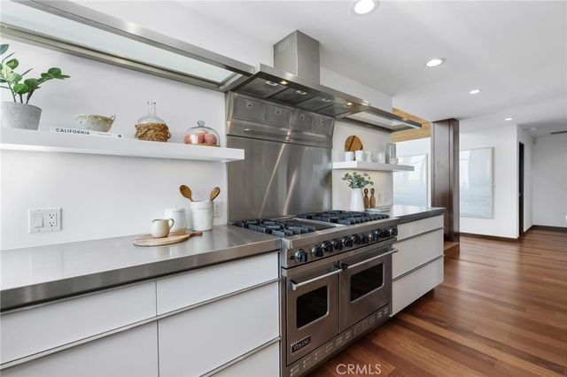 a bed room with a bed and a large window