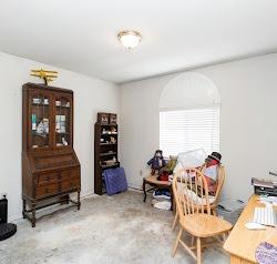 21780 Valley View Road Madera, CA 93638 - Photo 13 of 22 a living room with furniture and a closet