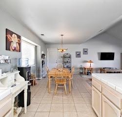 21780 Valley View Road Madera, CA 93638 - Photo 10 of 22 a living room with furniture and a flat screen tv