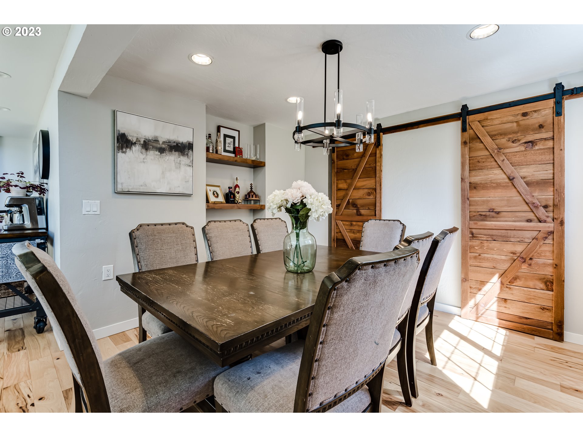 1163 Laurel Avenue Springfield, OR 97478 - Photo 12 of 44 a view of a dining room with furniture and wooden floor