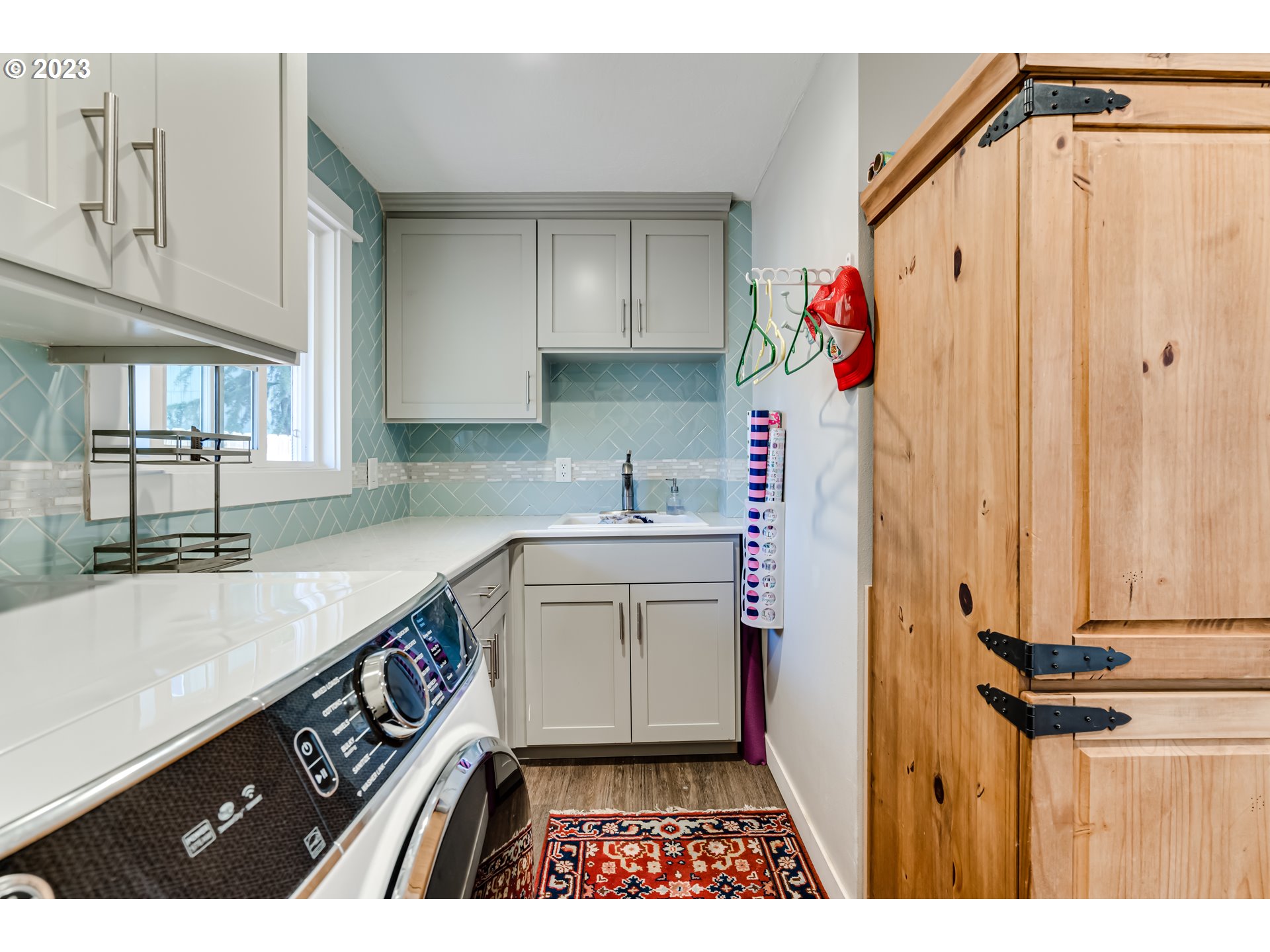 1163 Laurel Avenue Springfield, OR 97478 - Photo 25 of 44 a kitchen with a sink and cabinets