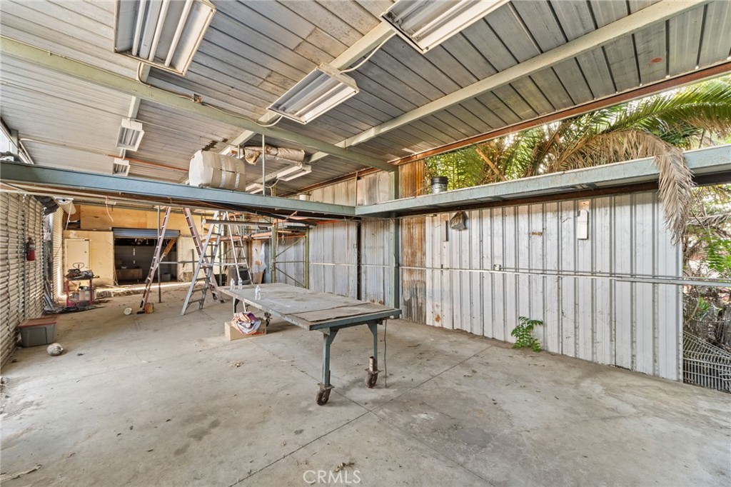 3869 Shamrock Avenue Riverside, CA 92501 - Photo 23 of 34 a view of a porch with furniture and a grill