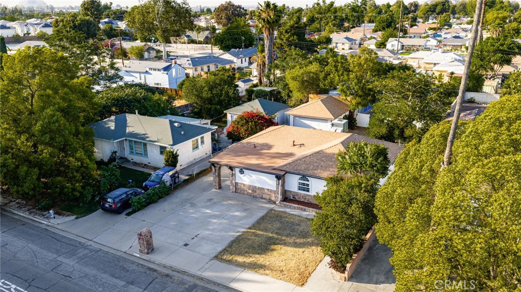 3869 Shamrock Avenue Riverside, CA 92501 - Photo 29 of 34 an aerial view of a house with garden space and street view
