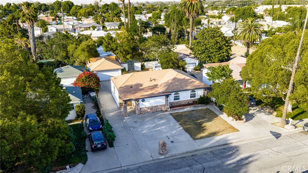 3869 Shamrock Avenue Riverside, CA 92501 - Photo 31 of 34 an aerial view of a house with swimming pool garden and patio