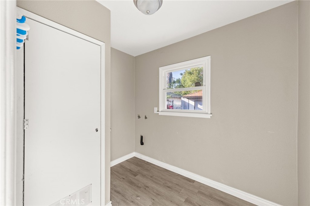 3869 Shamrock Avenue Riverside, CA 92501 - Photo 9 of 34 a view of small space with wooden floor and fan