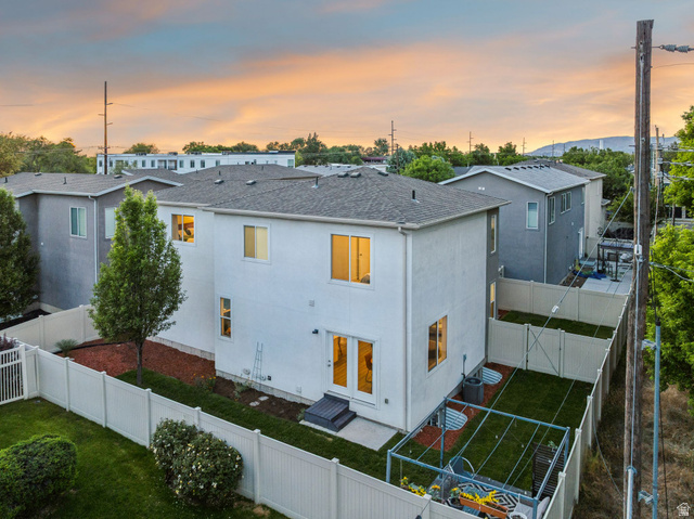 4595 College Ridge Court Millcreek, UT 84117 - Photo 52 of 57 Two-story residence featuring a white stucco exterior and a gray shingle roof