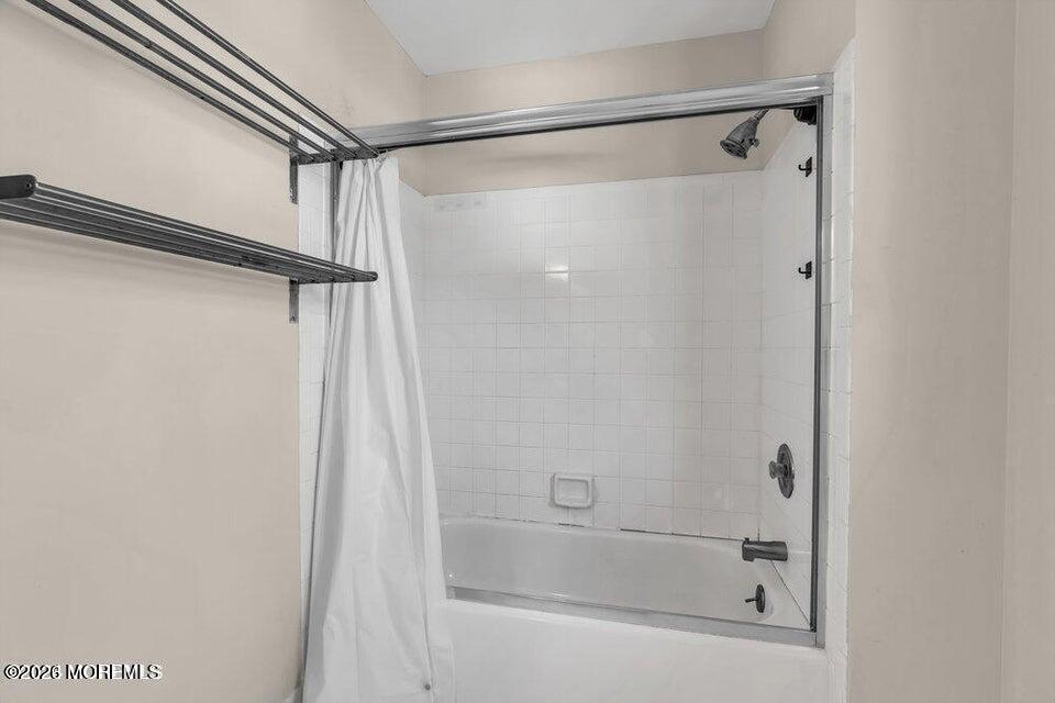 60 Bowman Road Jackson, NJ 08527 - Photo 16 of 68 a bathroom with a shower and a bath tub