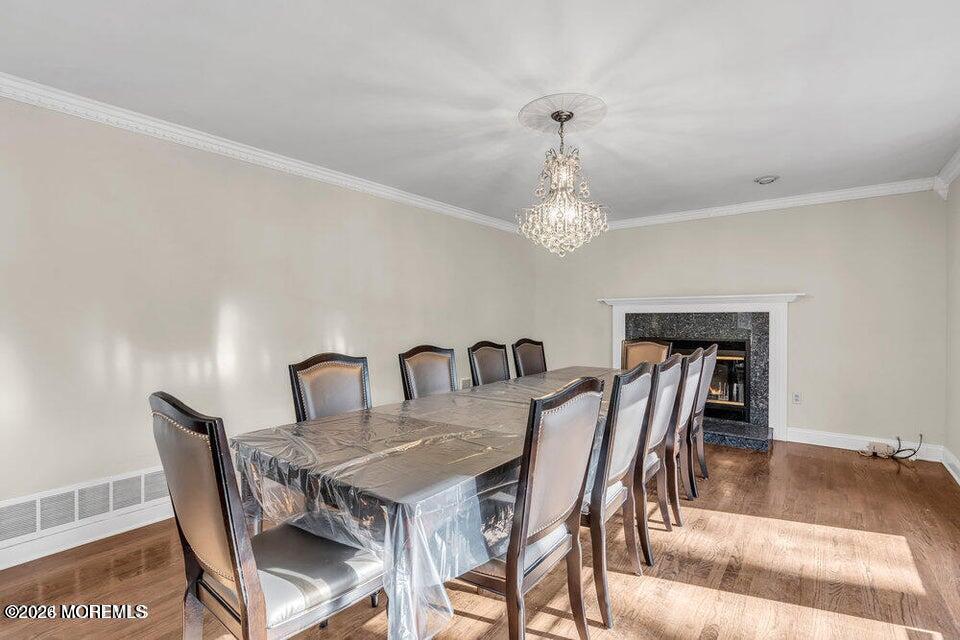 60 Bowman Road Jackson, NJ 08527 - Photo 4 of 68 a view of a dining room with furniture and chandelier