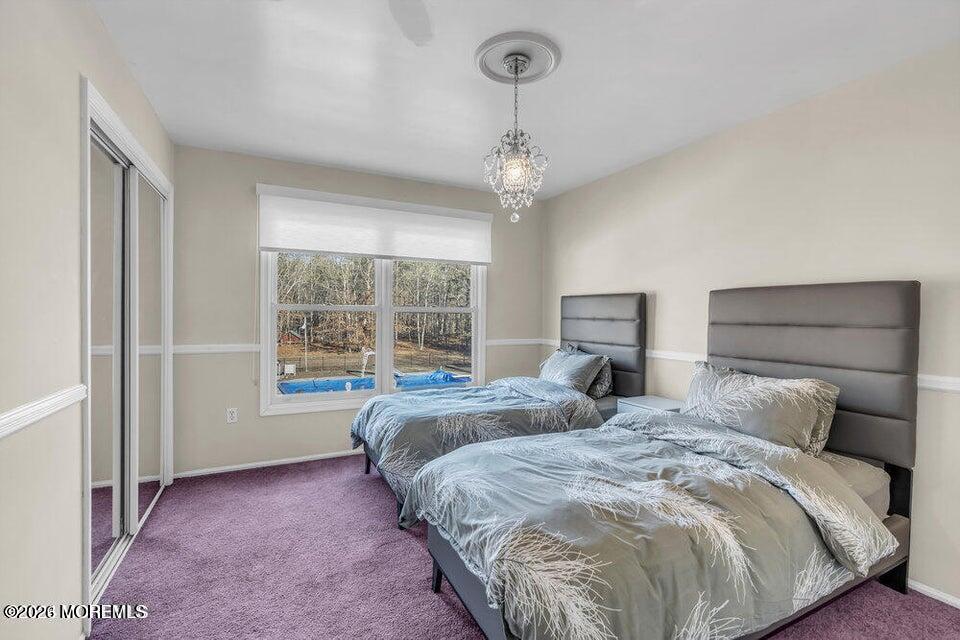 60 Bowman Road Jackson, NJ 08527 - Photo 47 of 68 a bedroom with a large bed and a window