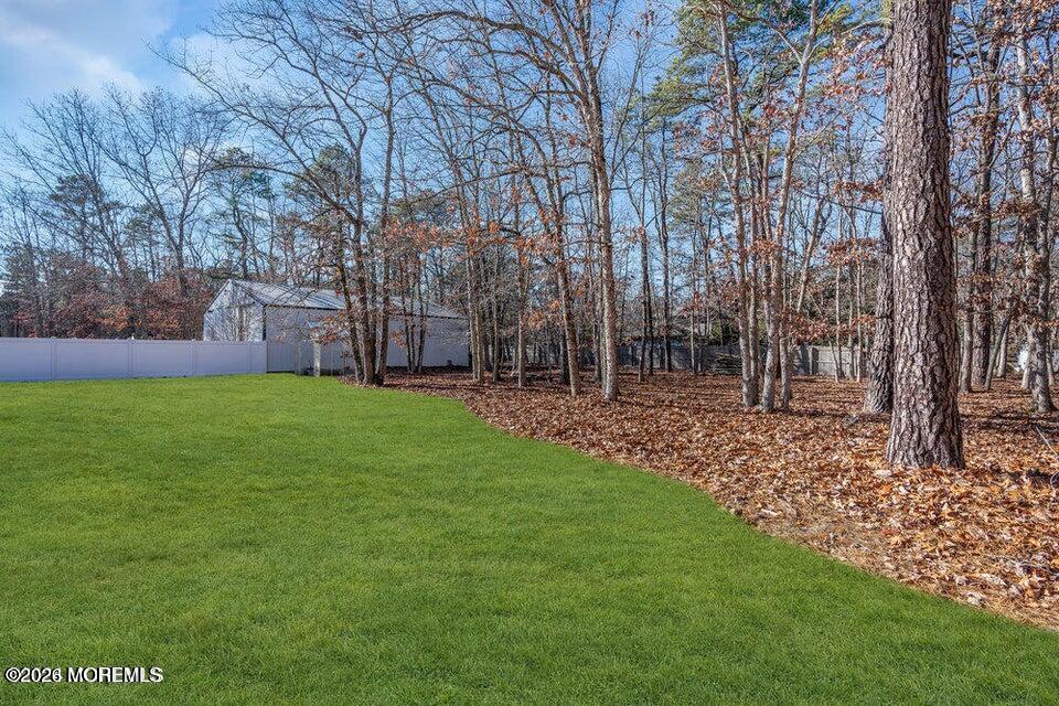 60 Bowman Road Jackson, NJ 08527 - Photo 54 of 68 a backyard of a house with lots of green space