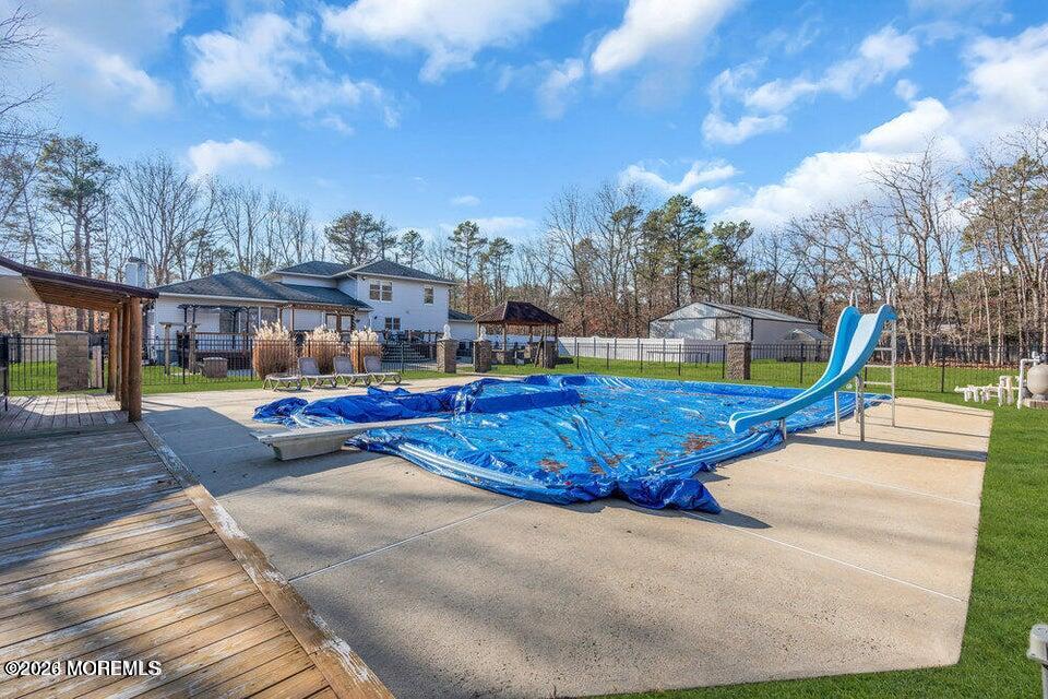 60 Bowman Road Jackson, NJ 08527 - Photo 63 of 68 a view of outdoor space with swimming pool and fire pit