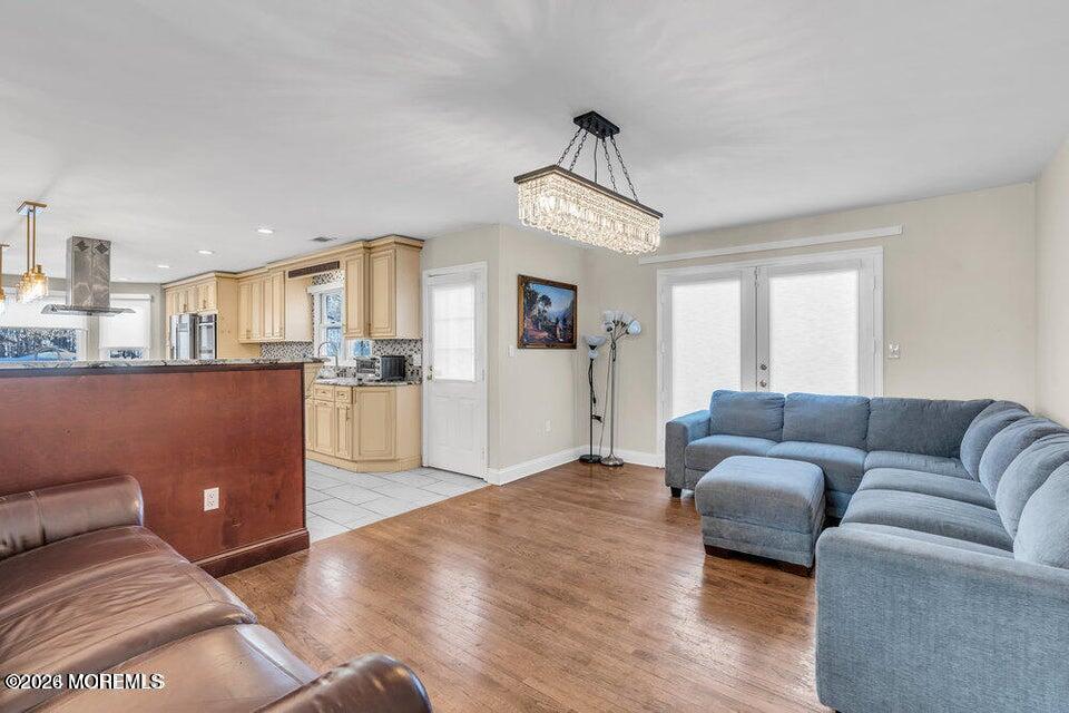 60 Bowman Road Jackson, NJ 08527 - Photo 10 of 68 a living room with furniture and kitchen view