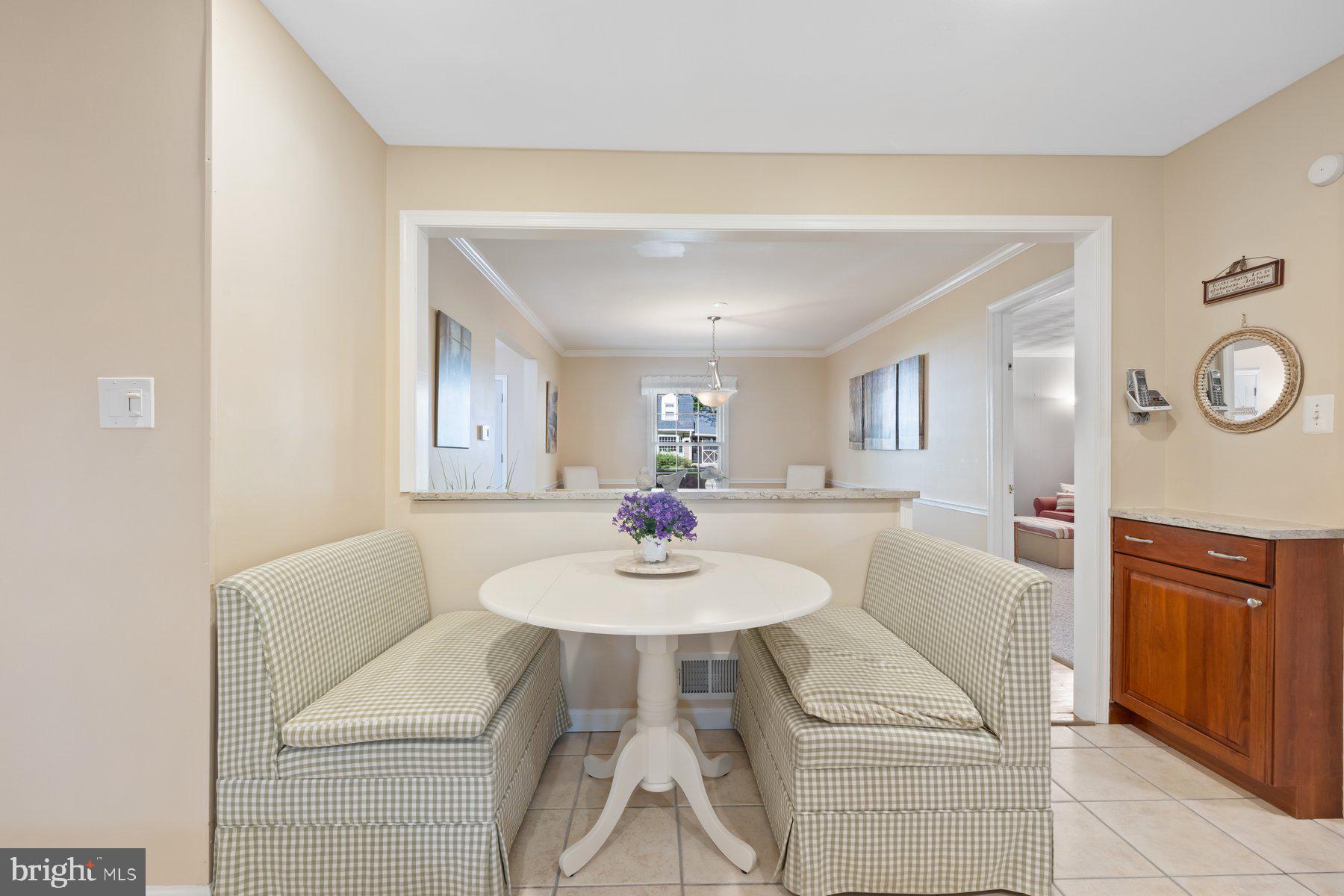 13820 Flint Rock Road Rockville, MD 20853 - Photo 20 of 50 a view of a dining room with furniture and a chandelier