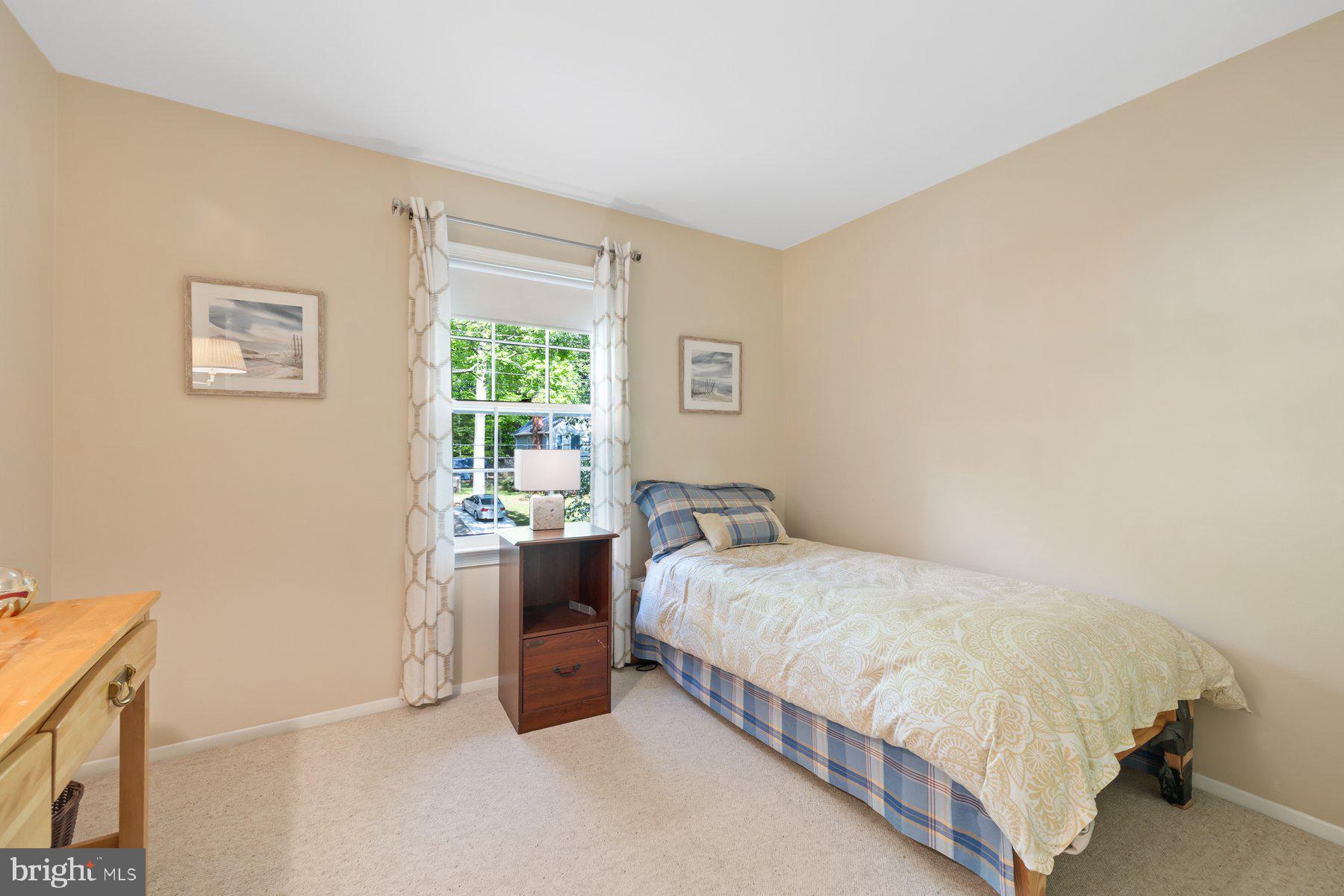 13820 Flint Rock Road Rockville, MD 20853 - Photo 30 of 50 a bedroom with a bed and a window