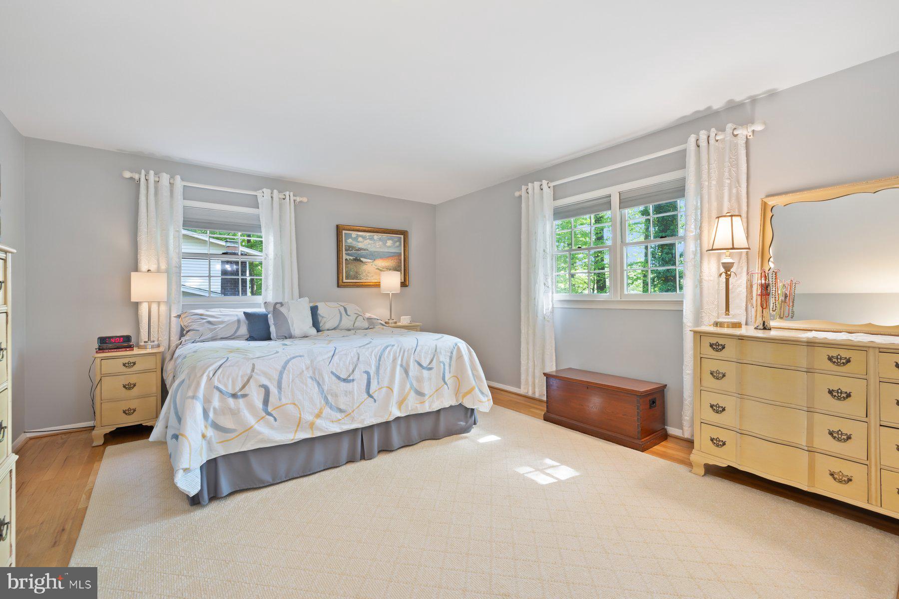 13820 Flint Rock Road Rockville, MD 20853 - Photo 34 of 50 a bedroom with a large bed and window