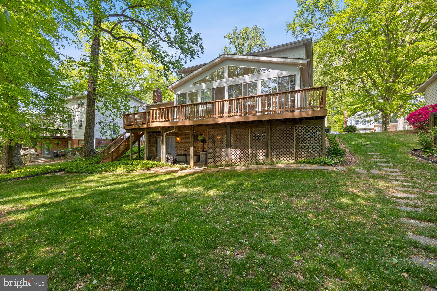 13820 Flint Rock Road Rockville, MD 20853 - Photo 44 of 50 a front view of a house with garden