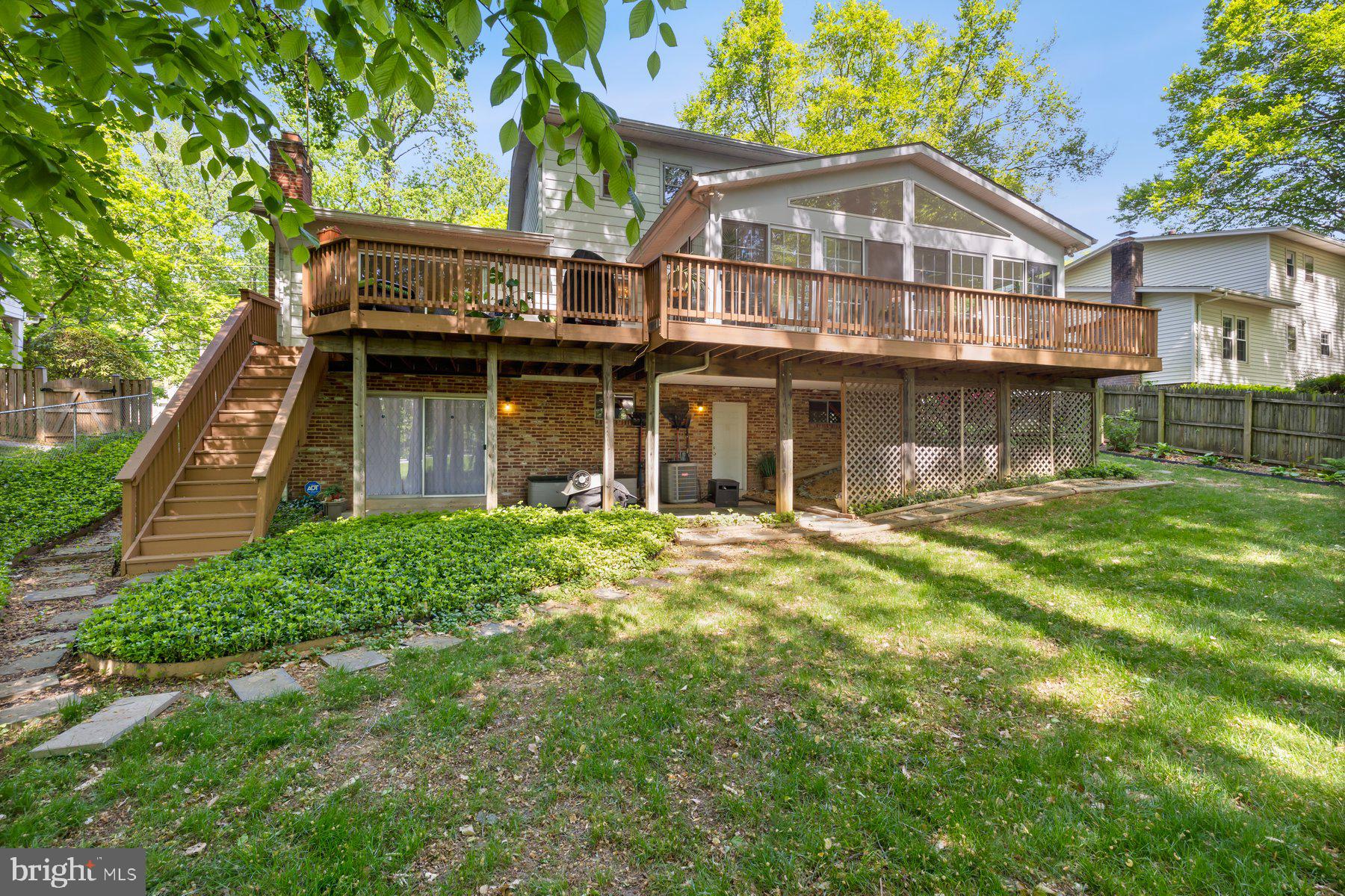 13820 Flint Rock Road Rockville, MD 20853 - Photo 46 of 50 a front view of a house with a garden