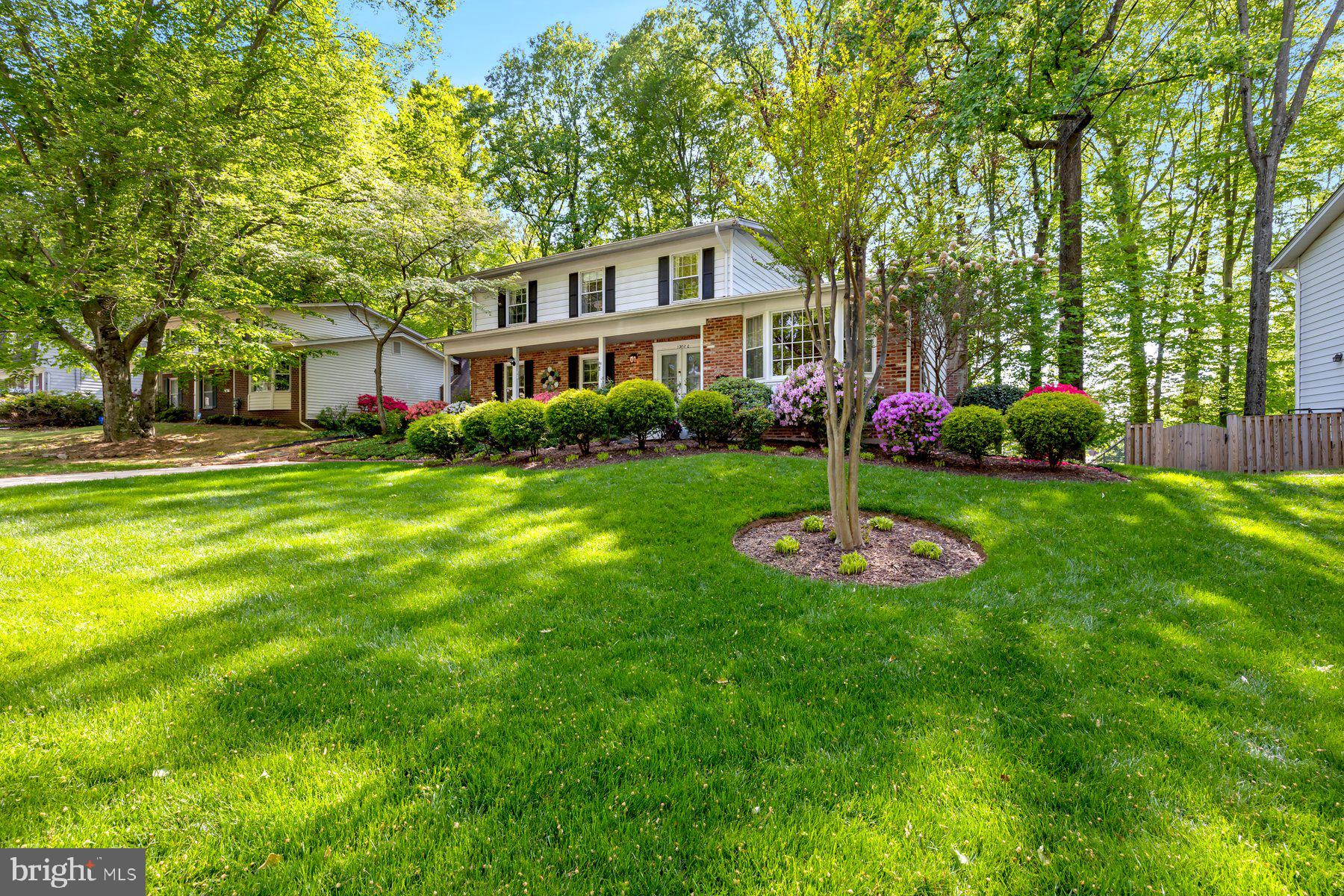 13820 Flint Rock Road Rockville, MD 20853 - Photo 5 of 50 a view of a house with a yard and sitting area