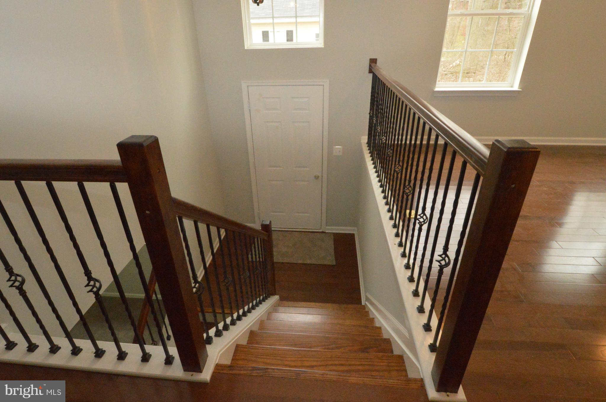 12106 Tarragon Road Reisterstown, MD 21136 - Photo 3 of 25 Hardwoods & Custom Railing