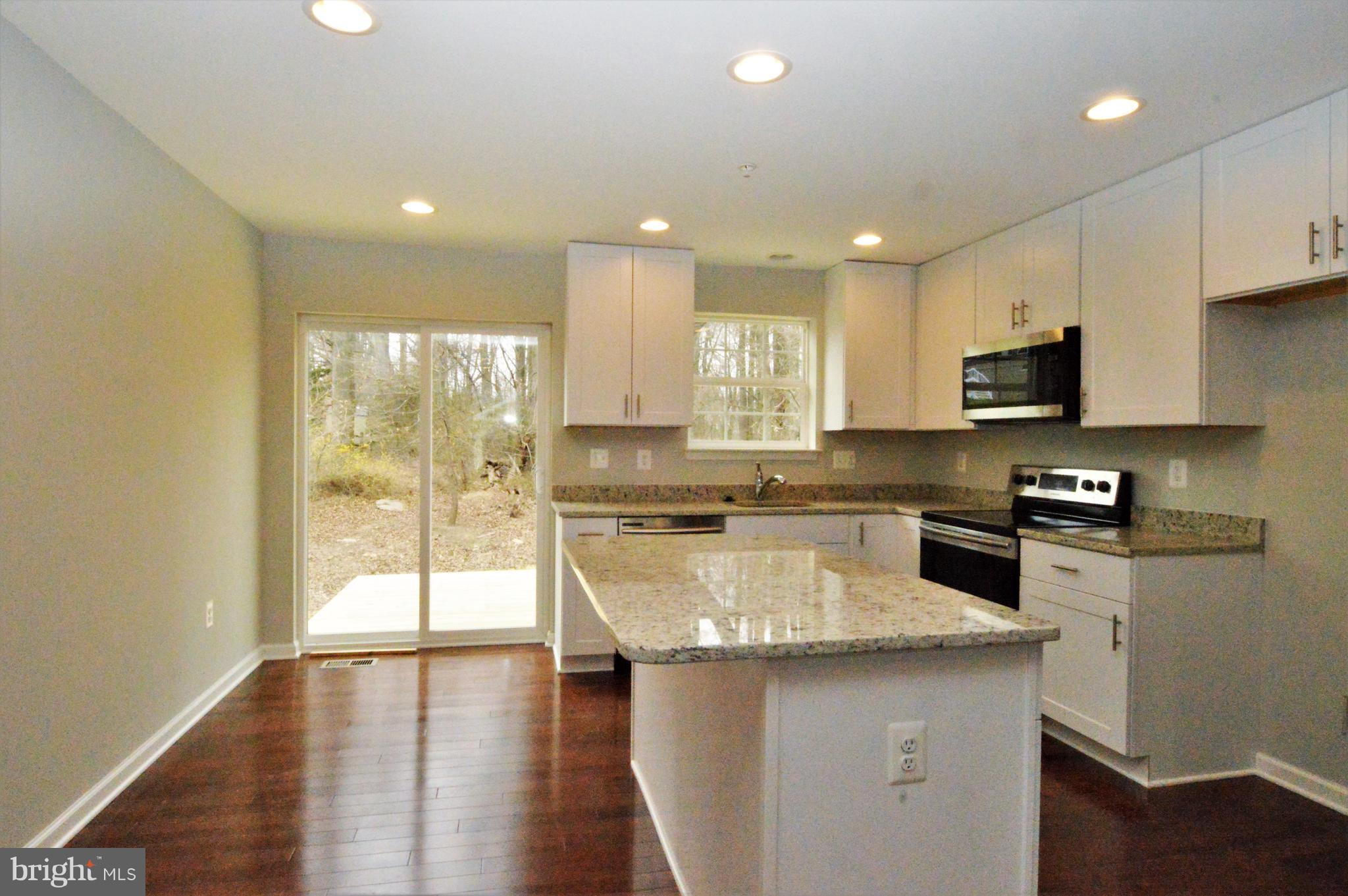 12106 Tarragon Road Reisterstown, MD 21136 - Photo 6 of 25 Open to Dining Area