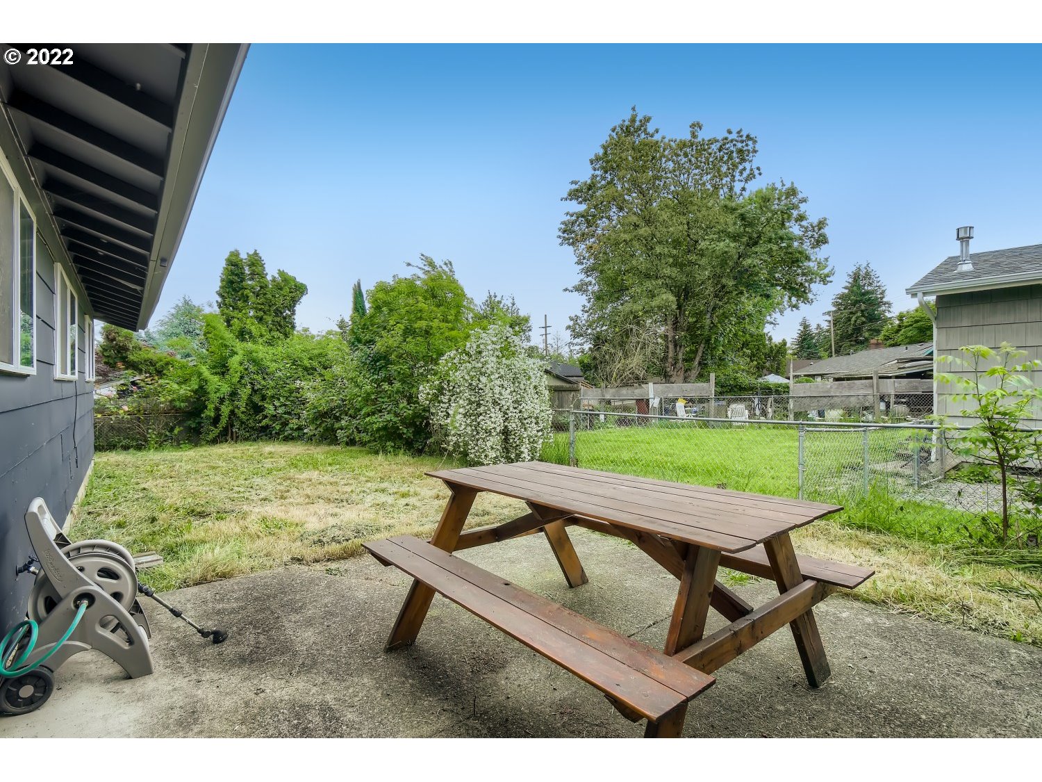 7109 North Sedro Street Portland, OR 97203 - Photo 25 of 28 a view of a backyard with sitting area