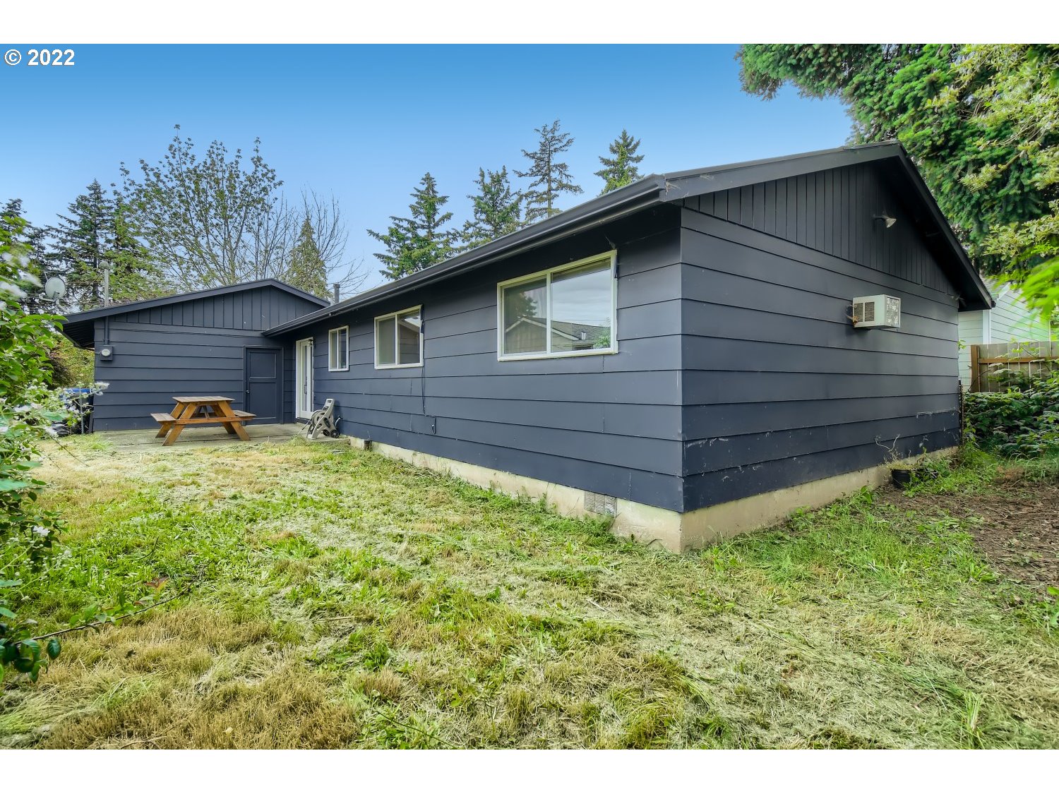 7109 North Sedro Street Portland, OR 97203 - Photo 27 of 28 a backyard of a house with lots of green space