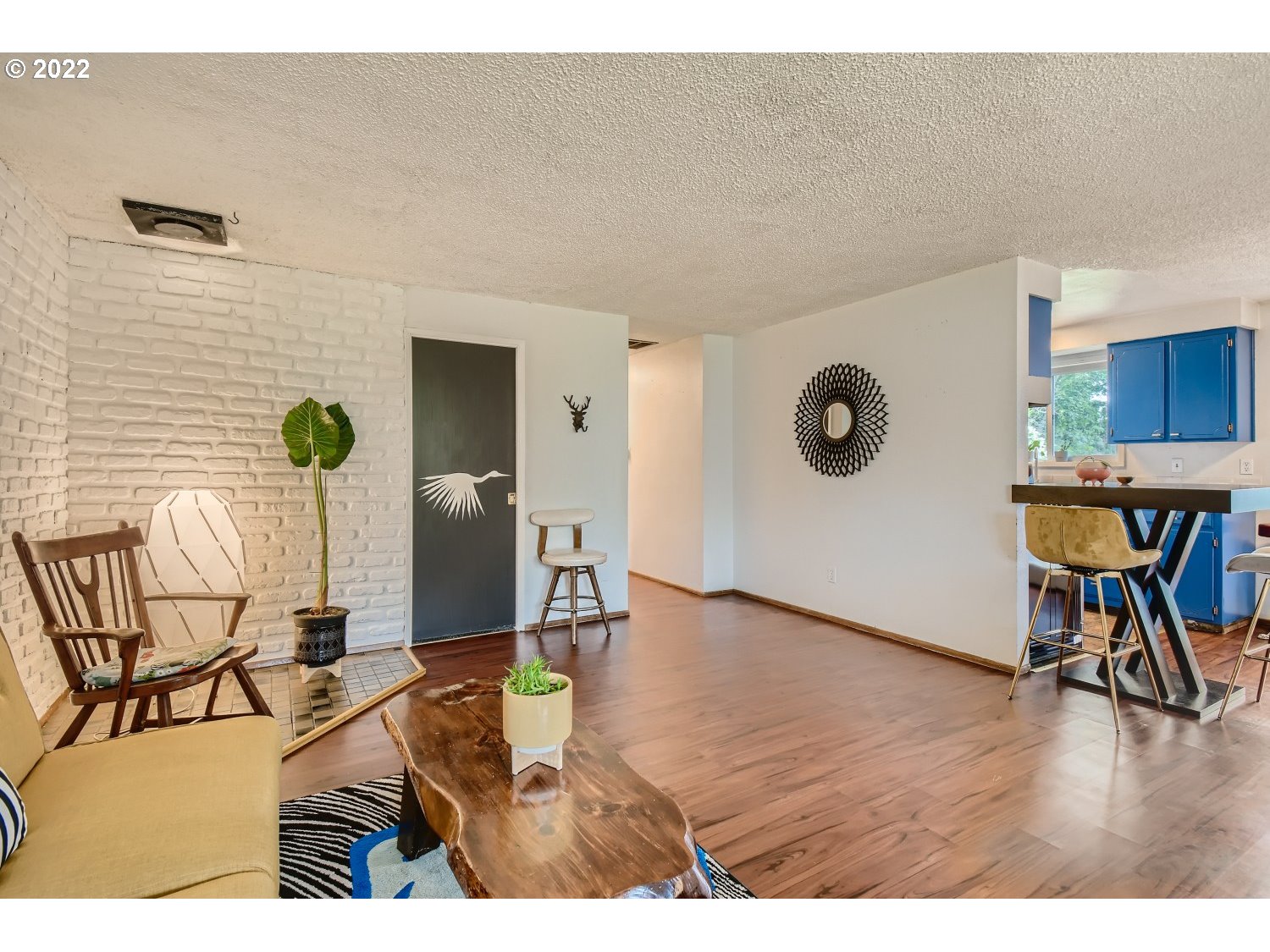 7109 North Sedro Street Portland, OR 97203 - Photo 7 of 28 a view of a dining room with furniture and wooden floor