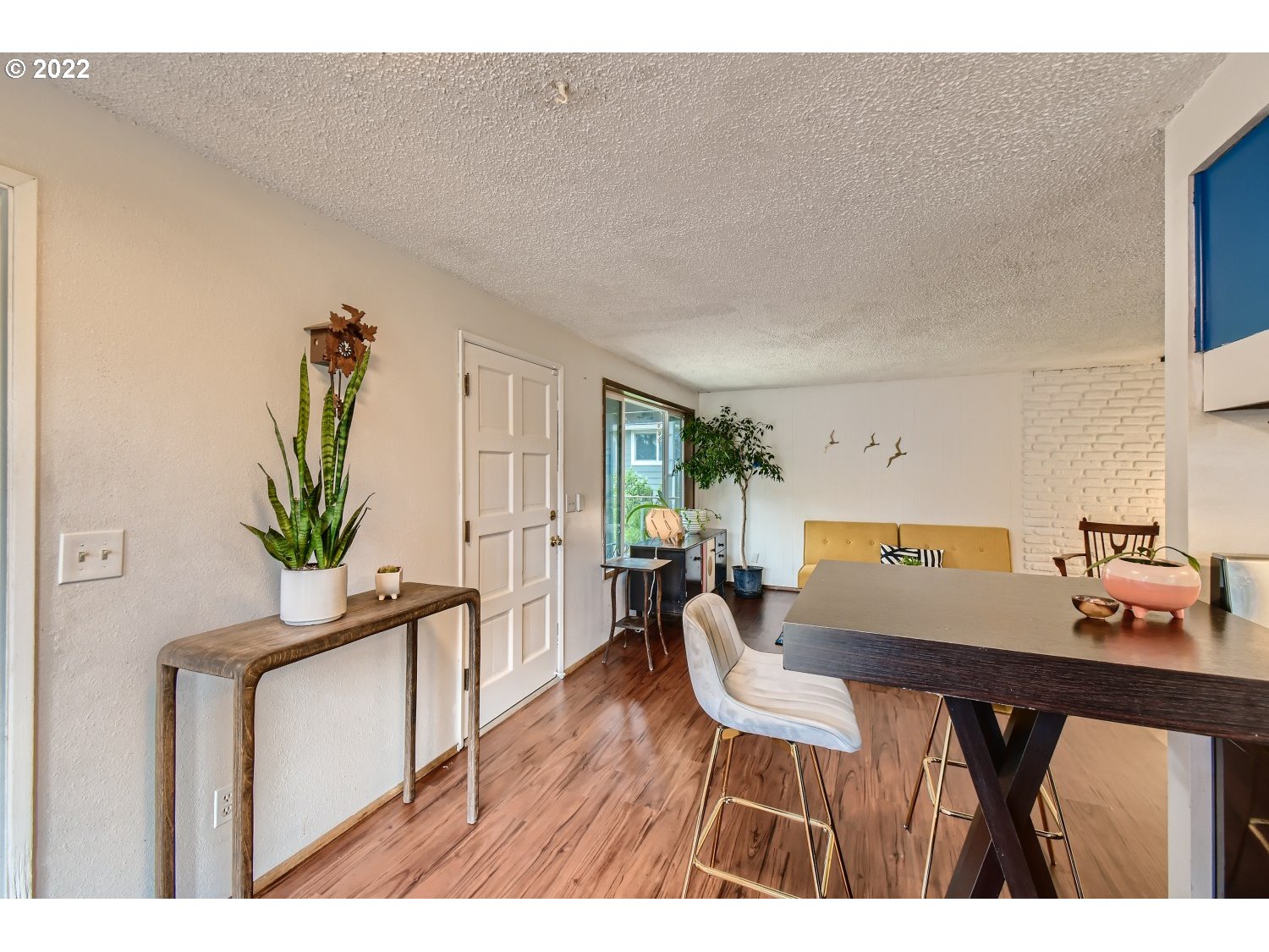 7109 North Sedro Street Portland, OR 97203 - Photo 9 of 28 a dining room with furniture and wooden floor