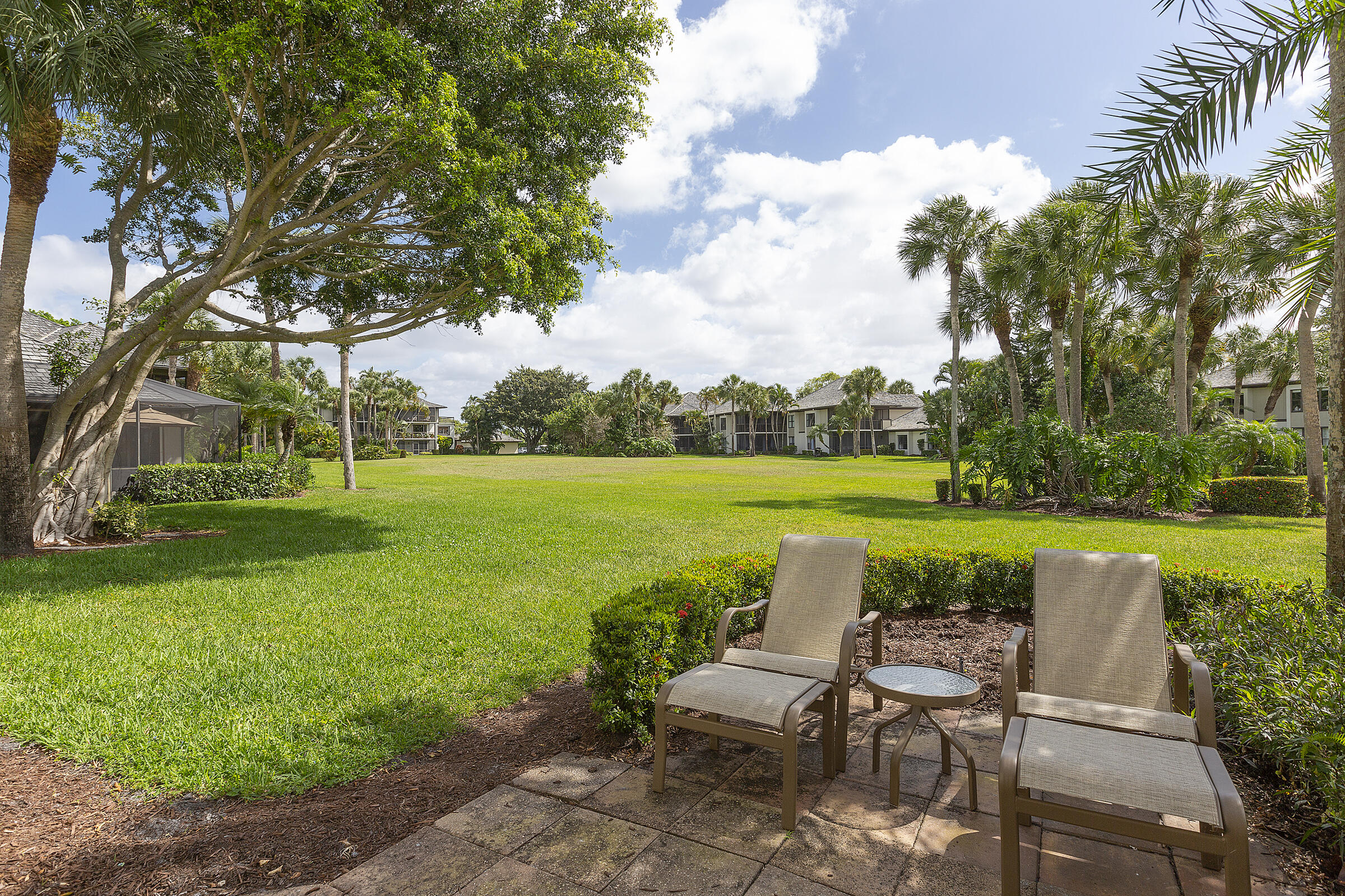 13254 Polo Club Road, Unit C104 Wellington, FL 33414 - Photo 32 of 35 34_ViewFromExteriorPatio