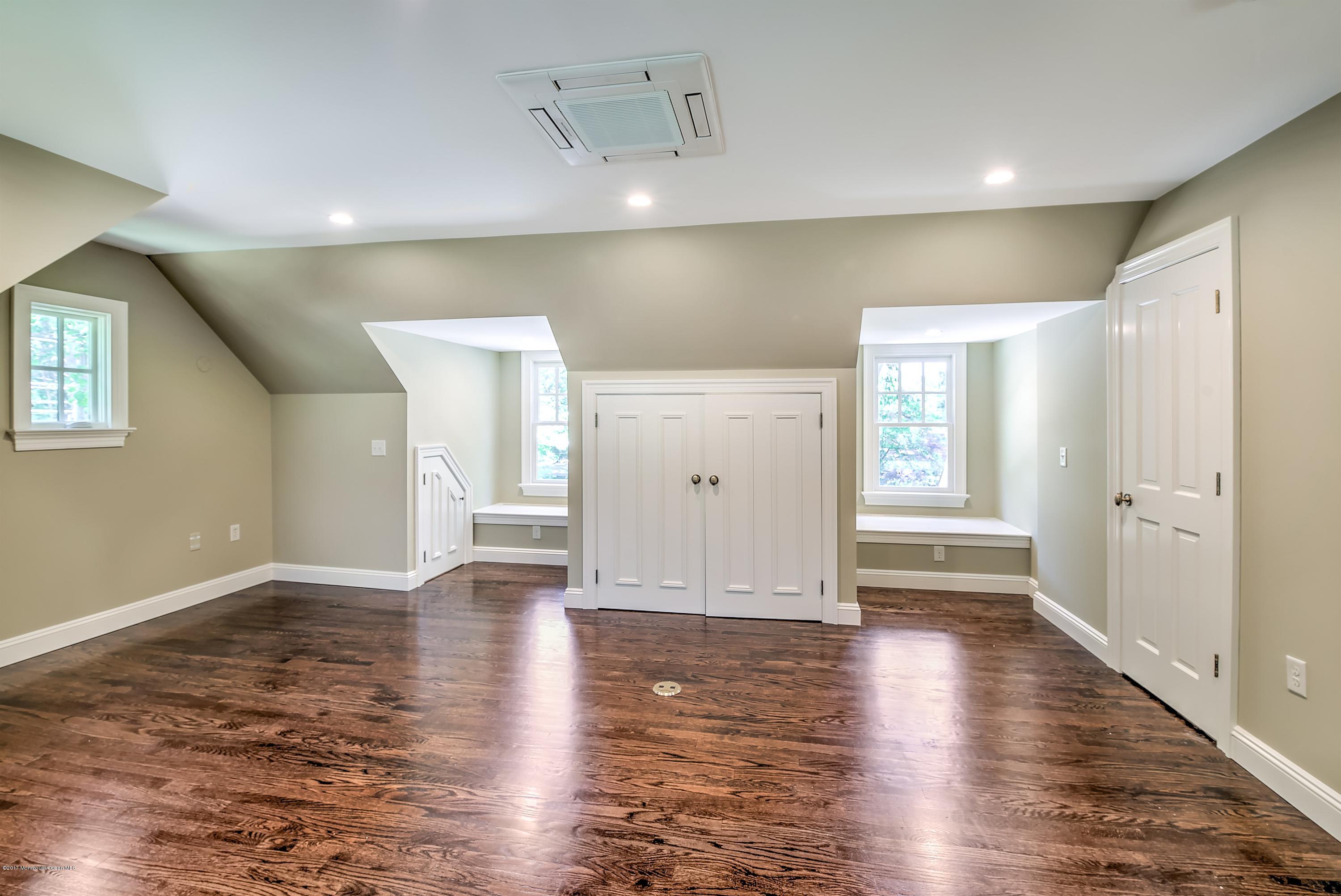 25 Phalanx Road Lincroft, NJ 07738 - Photo 24 of 35 031_APARTMENT LIVING ROOM