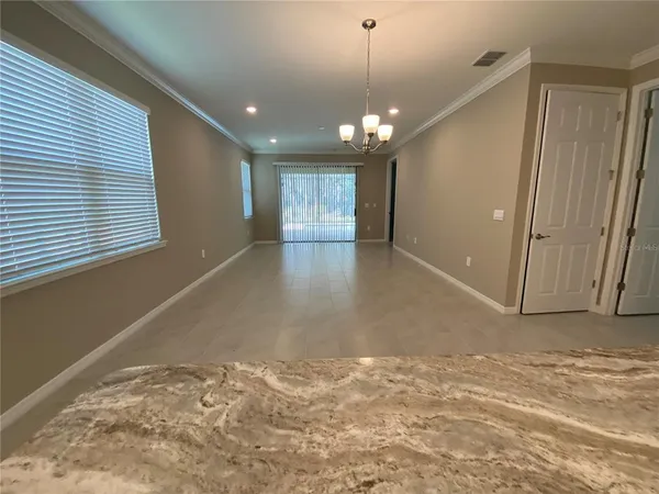 a view of a livingroom with a ceiling fan