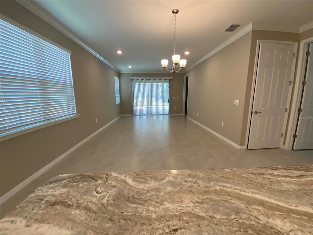 124 Soliera Street Nokomis, FL 34275 - Photo 14 of 43 a view of a livingroom with a ceiling fan