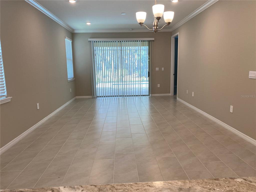 124 Soliera Street Nokomis, FL 34275 - Photo 15 of 43 a view of an empty room with a window