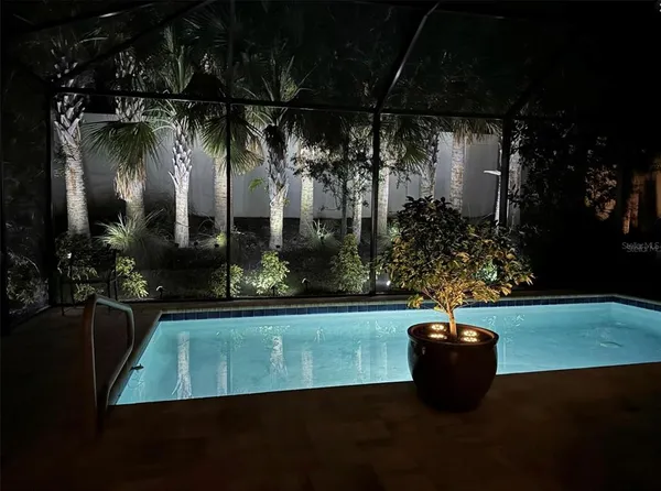 a view of swimming pool outdoor seating