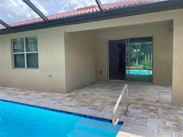 a view of a backyard of a house
