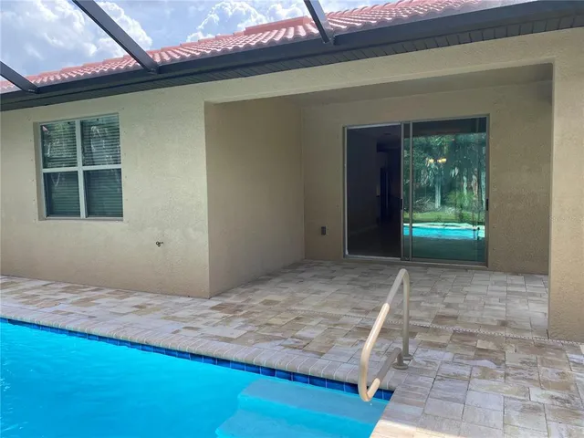 a view of a backyard of a house