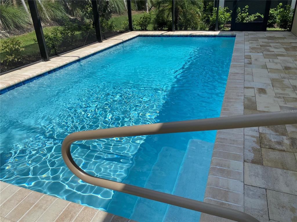 124 Soliera Street Nokomis, FL 34275 - Photo 23 of 43 a view of swimming pool from a balcony