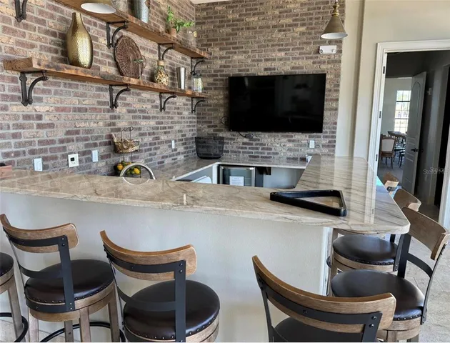 a view of a swimming pool and outside space