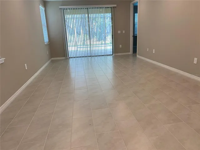 a kitchen with a sink and a vanity