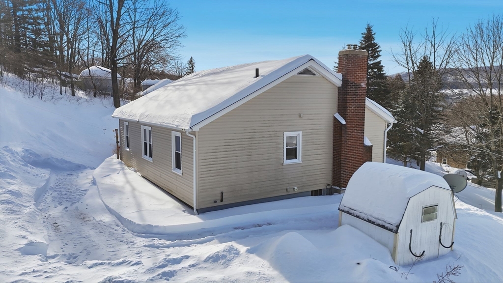 40 Victory Terrace Adams, MA 01220 - Photo 15 of 25 a view of a house with a yard and sitting area