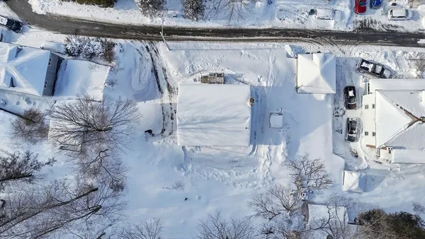 an aerial view of a city with lots of residential buildings