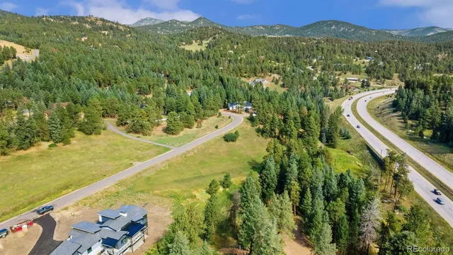 a view of a city and mountains