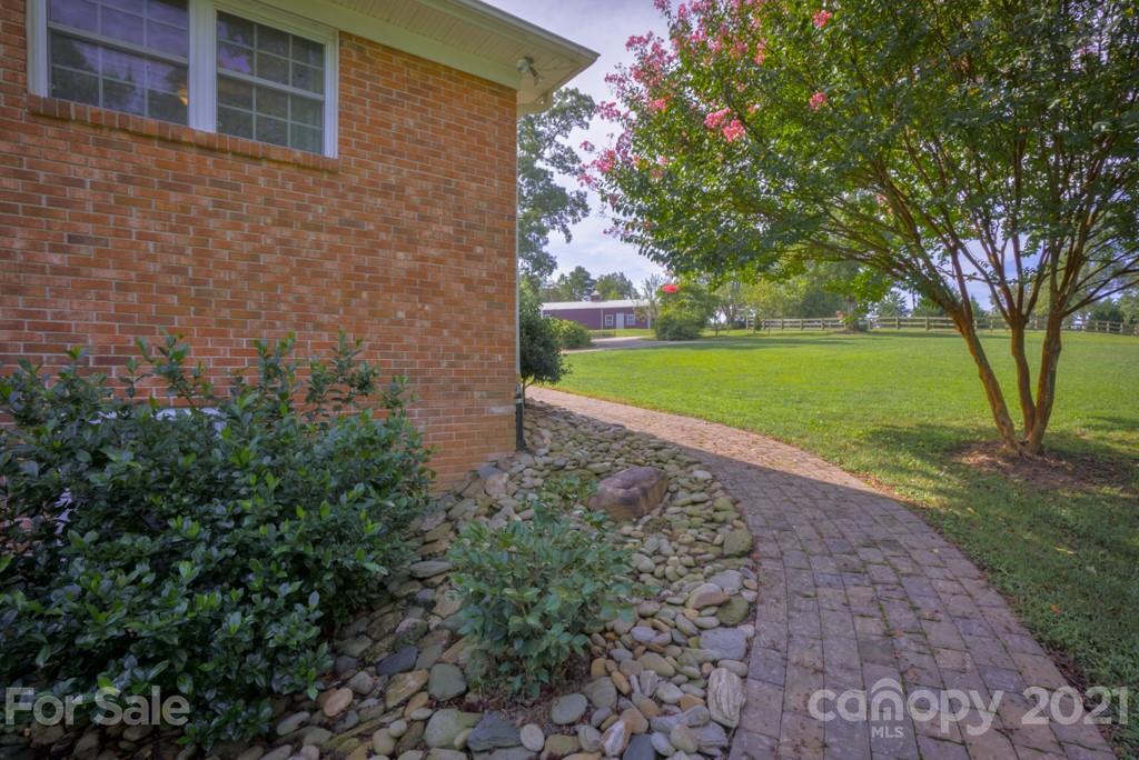 2667 Bill Collins Road Tryon, NC 28782 - Photo 20 of 48 a view of a backyard with large trees