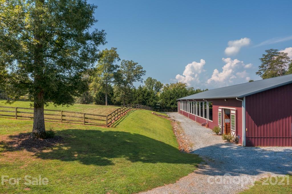 2667 Bill Collins Road Tryon, NC 28782 - Photo 3 of 48 a view of a house with a yard