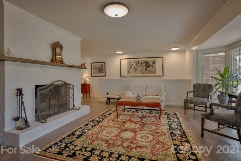 2667 Bill Collins Road Tryon, NC 28782 - Photo 22 of 48 a living room with furniture and a fireplace