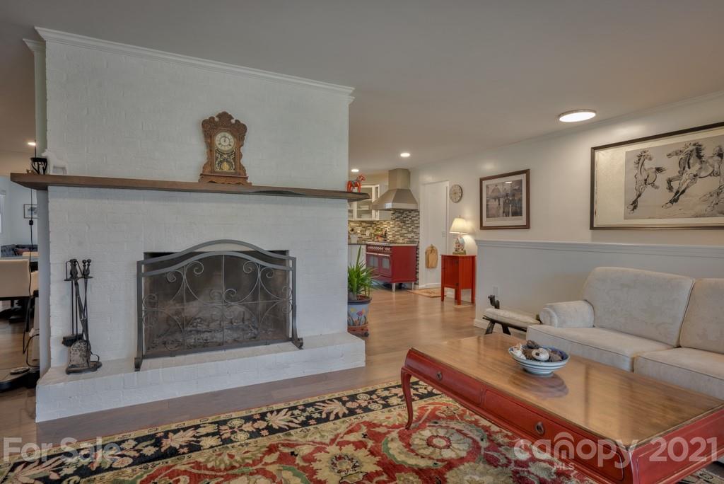 2667 Bill Collins Road Tryon, NC 28782 - Photo 23 of 48 a living room with furniture and a fireplace