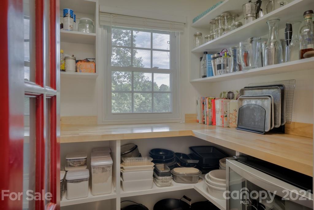2667 Bill Collins Road Tryon, NC 28782 - Photo 31 of 48 a kitchen with furniture and a window