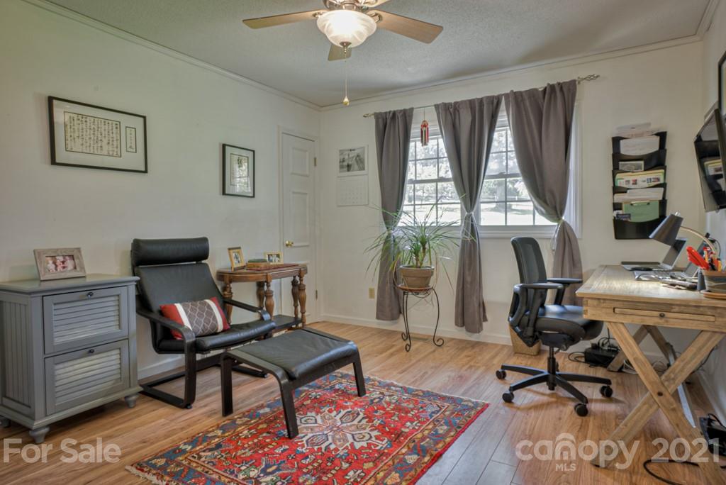 2667 Bill Collins Road Tryon, NC 28782 - Photo 42 of 48 a workspace with wooden floor and a workspace