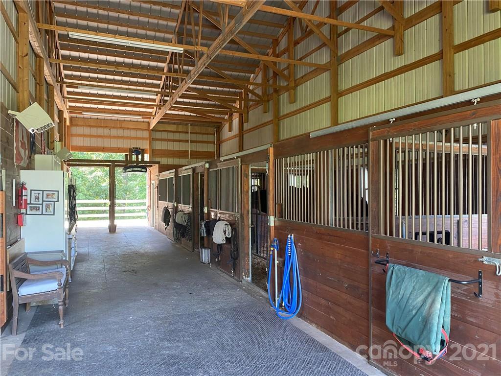 2667 Bill Collins Road Tryon, NC 28782 - Photo 7 of 48 a view of a garage with table and chairs