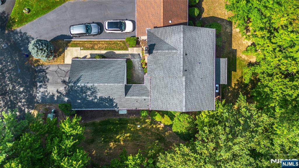 8 Tomahawk Drive Wayne, NJ 07470 - Photo 30 of 35 an aerial view of a house with a yard